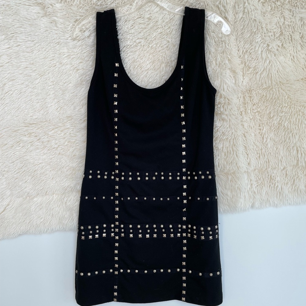 Ellison studded mini dress. Hugs body comfortably.